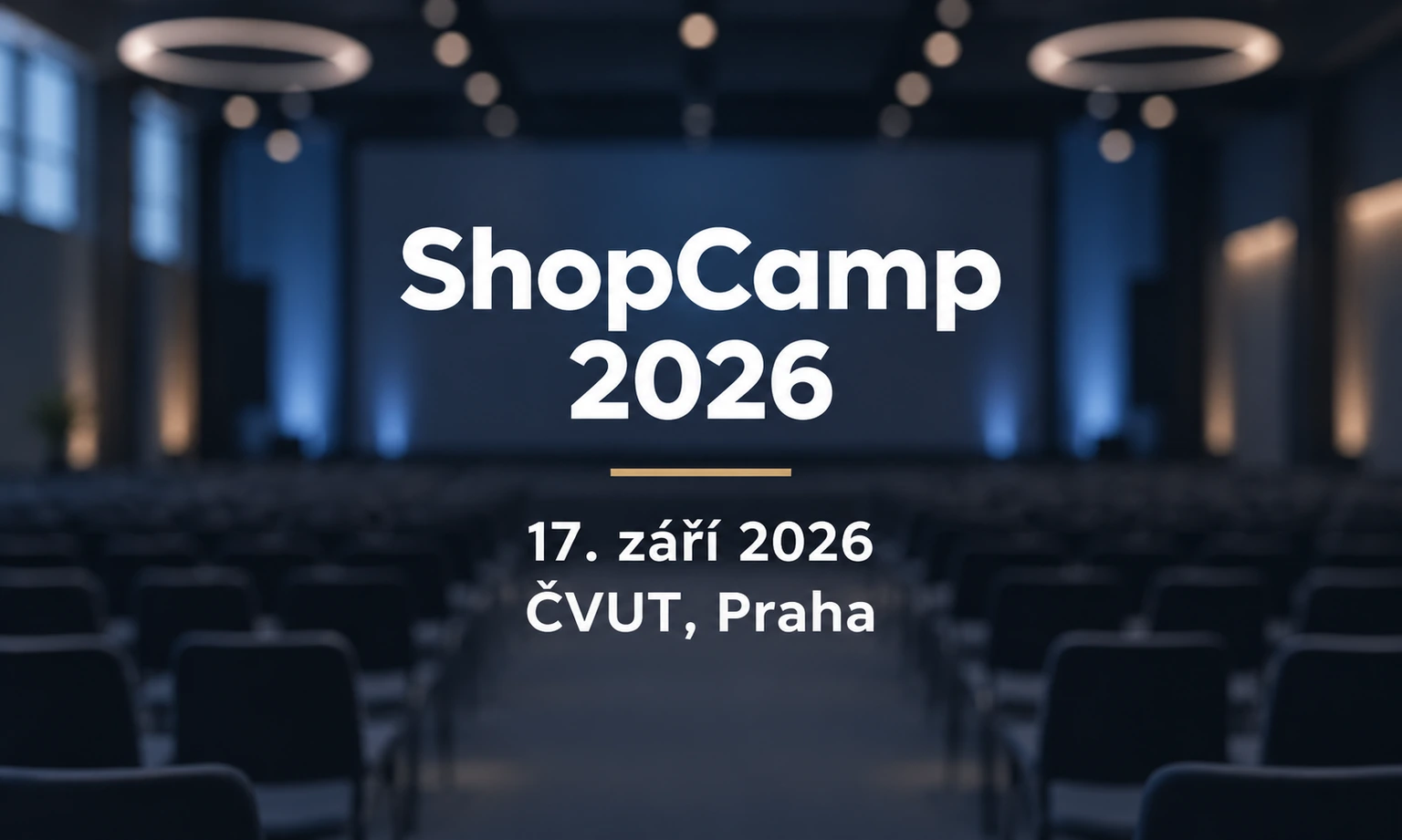 Ilustrační grafický náhled: ShopCamp 2026, 17. září 2026, ČVUT, Praha. Rozostřené konferenční pozadí vytvořené pomocí AI.